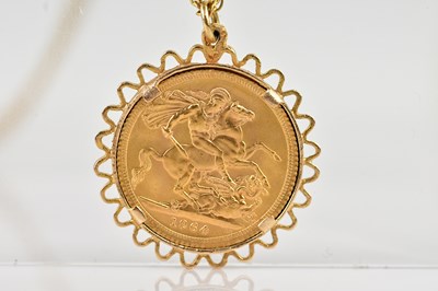 Lot 2028 - An Elizabeth II full sovereign, 1964, in 9ct...