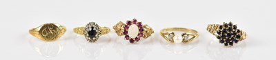Lot 2484 - A 9ct yellow gold opal cluster dress ring,...