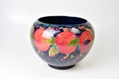 Lot 176 - MOORCROFT; a 'Pomegranate' pattern jardinière...