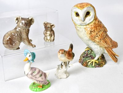 Lot 146 - BESWICK; four models, comprising barn owl no....