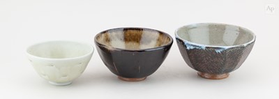 Lot 554 - PETER SWANSON (born 1950); a faceted stoneware...