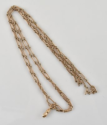 Lot 2022 - A 9ct yellow gold fancy trombone link belcher...