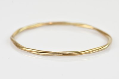 Lot 1136 - A 9ct yellow gold bangle, internal diameter...
