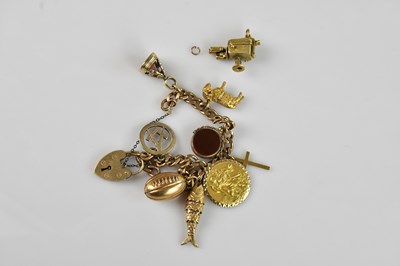 Lot 1105 - A 9ct yellow gold flat link bracelet, set with...