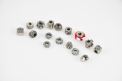 Lot 207 - PANDORA; sixteen sterling silver charms for a...