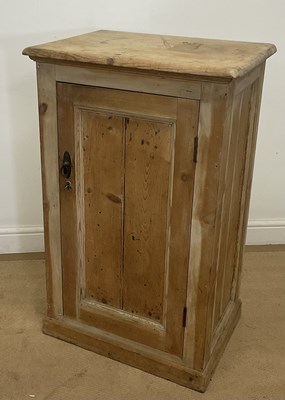 Lot 801 - A pine cupboard, with single door and two...