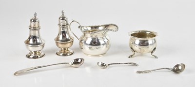 Lot 377 - A pair of hallmarked silver pepperettes,...