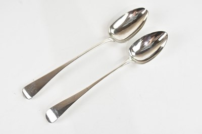 Lot 155 - Two George III hallmarked silver basting...