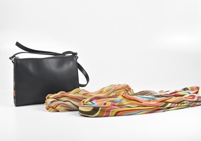 Lot 184 - A navy blue calfskin crossbody handbag, with...