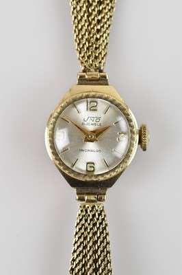 Lot 499 - UNO; a lady's 9ct gold cased wristwatch, the...