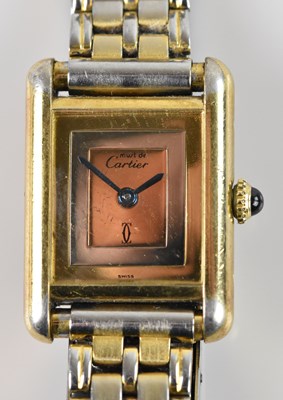 Lot 490 - MUST DE CARTIER; a lady's sterling silver...