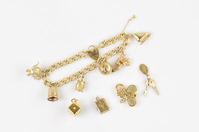 Lot 1116 - A 9ct yellow gold flat link bracelet with 9ct...