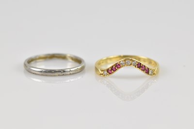 Lot 2475 - A platinum wedding band, size N, approx 2.85g,...