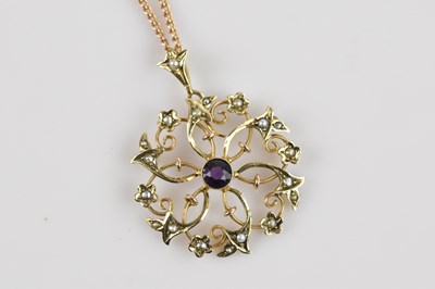 Lot 2111 - An Edwardian seed pearl and amethyst pendant...