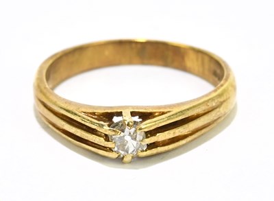 Lot 1085 - An 18ct yellow gold signet ring set with...