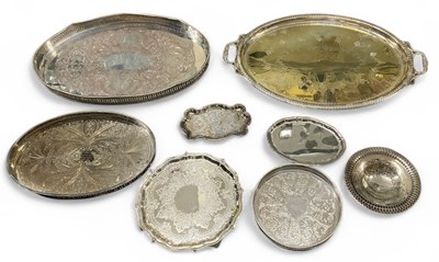 Lot 1129 - Seven various serving trays, the largest 71 x...