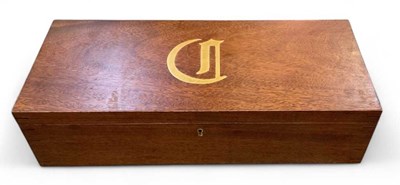 Lot 320 - A craftsman made long teak box, inset with an...