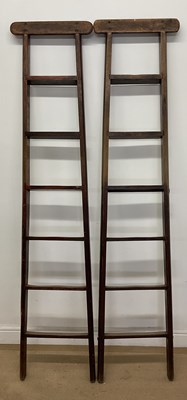 Lot 839 - A pair of mahogany library steps, height 177cm.