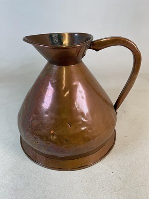 Lot 315 - A large 19th century copper measuring jug,...