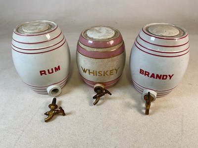 Lot 20 - Rum, whiskey and brandy ceramic barrels, with...