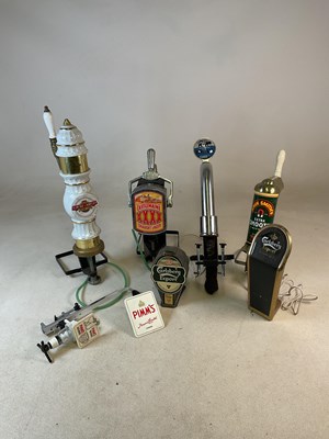 Lot 13 - A quantity of public house beer pumps, to...