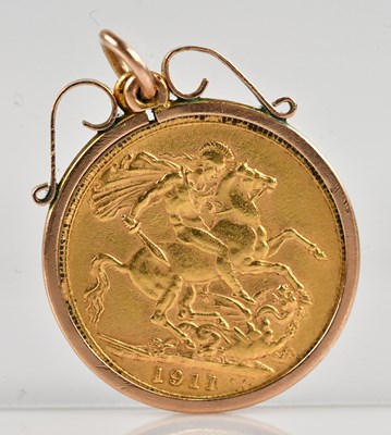 Lot 2025 - A George V full sovereign, 1911, in loose...