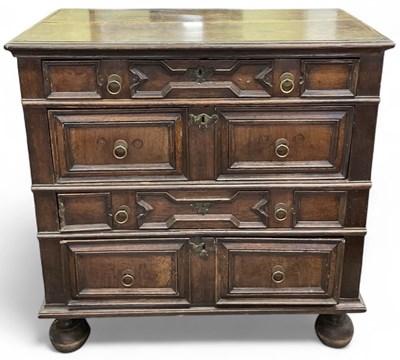 Lot 16 - A 17th century Jacobean oak chest of four long...