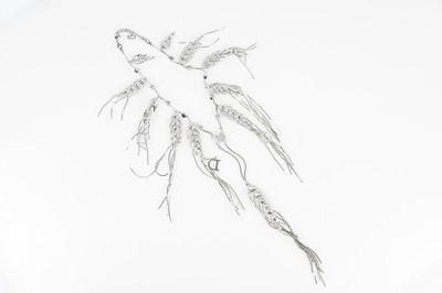 Lot 241 - CHRISTIAN DIOR; a silver tone rhodium plated...