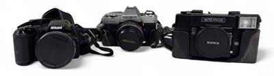 Lot 365 - Three assorted vintage cameras including Nikon...