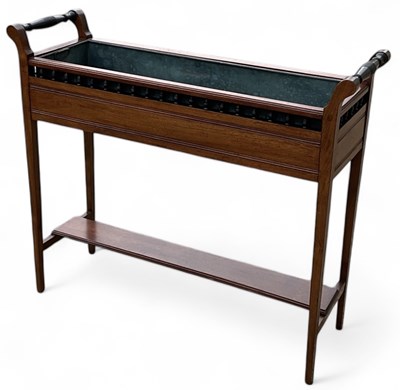 Lot 62 - An Edwardian oak twin handled rectangular...