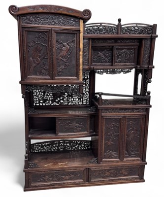 Lot 18 - A late 19th/early 20th century Japanese carved...