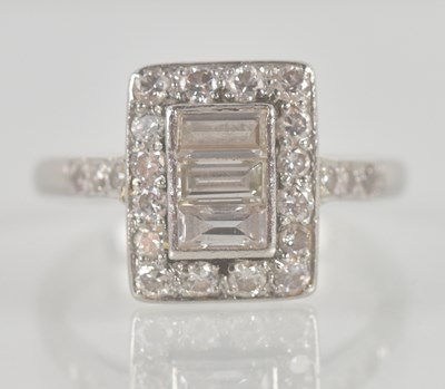 Lot 1293 - A 1920s Art Deco diamond set ring, the table...