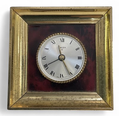 Lot 127 - SWIZA; a small key wind travel alarm clock...