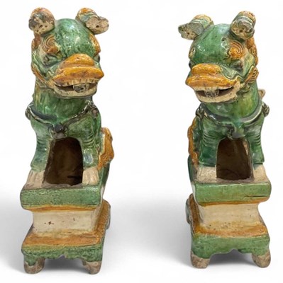 Lot 1100 - A pair of Tang style temple dog pottery...