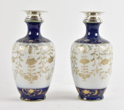 Lot 1270 - A pair of Japanese small porcelain vases with...