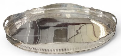 Lot 1115 - A large silver plated serving tray of oval...