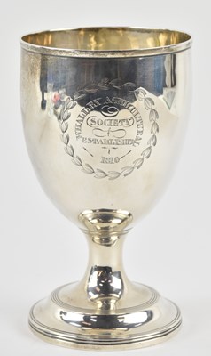 Lot 1200 - A George III hallmarked silver cup, presented...