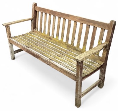 Lot 113 - A modern teak garden bench, width 151cm, depth...