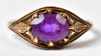 Lot 1160 - A 9ct gold ring claw set with amethyst, size P,...