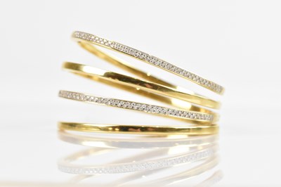 Lot 1093 - An Italian yellow metal diamond set multi-row...