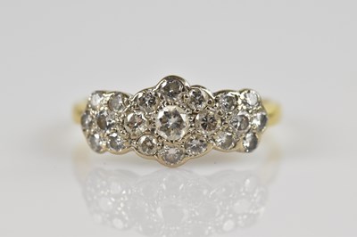Lot 2343 - A yellow metal diamond set cluster ring,...