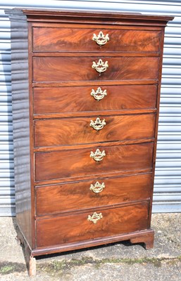 Lot 4 - A 19th century flame mahogany seven drawer...