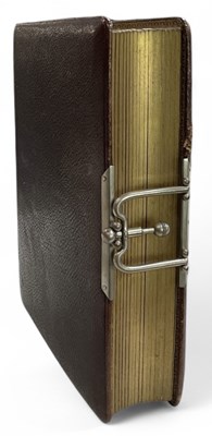 Lot 312 - A 19th century leather bound photograph album,...