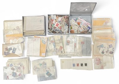 Lot 448 - A quantity of all world stamps, loose on paper...