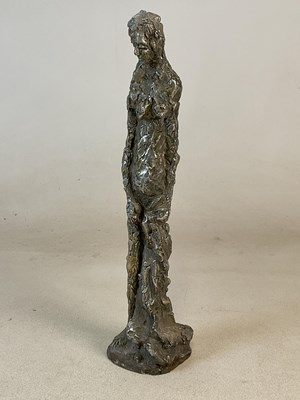 Lot 305 - A brutalist nude sculpture of a woman standing,...