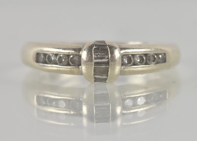 Lot 1310 - A 9ct white gold diamond ring, set with five...