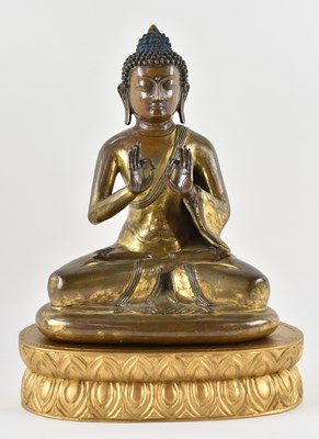 Lot 1017 - An 18th/19th century Chinese brass figure of...