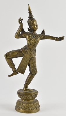 Lot 1050 - A 19th century Thai gilt bronze figure of a...
