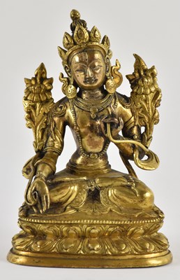 Lot 1088 - A 19th century Chinese gilt bronze figure of...