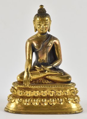 Lot 1089 - A 19th century Chinese gilt bronze...